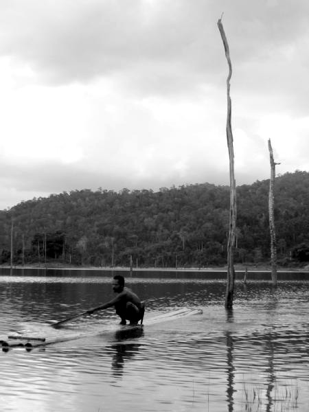 A Temiar bamboo rafting on Temenggor Lake